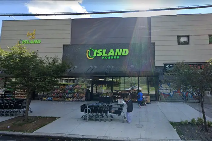 Police say a 25-year-old man fired a BB gun at a 35-year-old man and 7-year-old boy in front of a kosher market in the Meiers Corners section of Staten Island.